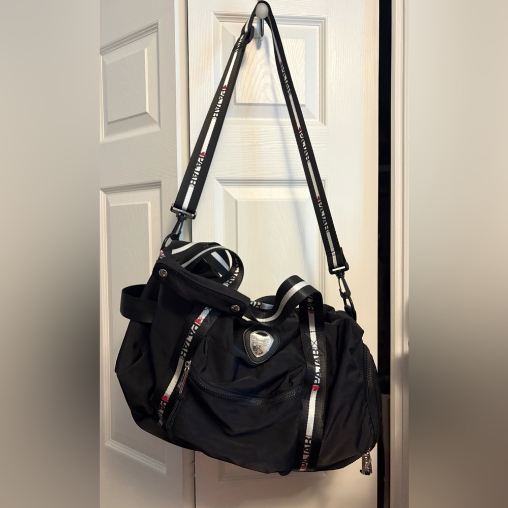 Pajar Black Duffel Bag with Adjustable Straps and Durable Fabric